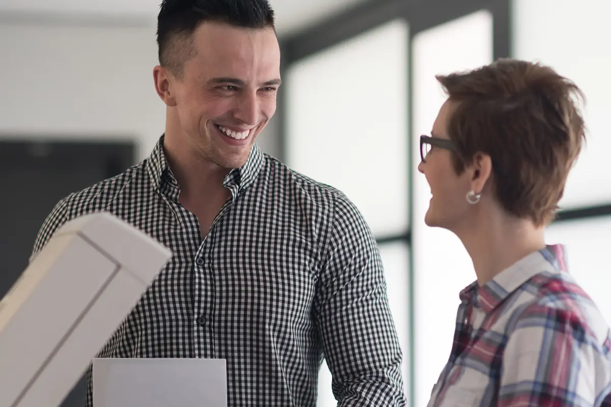 banner__0000s_0008_happy-business-people-group-modern-office-copy-documents-machine
